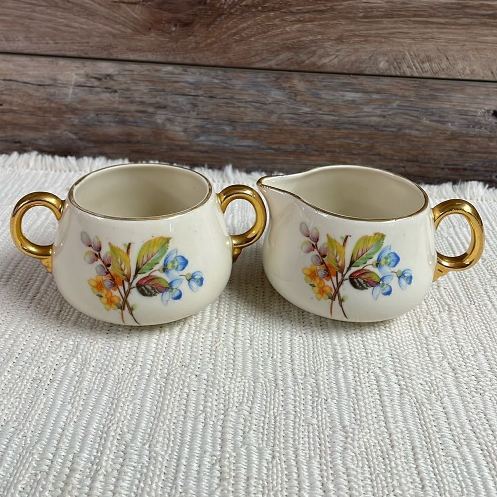 Cream and Sugar Porcelain Set with Gold Leaf Trim and Floral Design